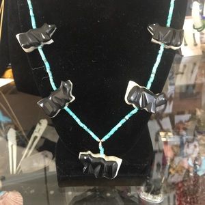 Handmade skunk necklace and earrings